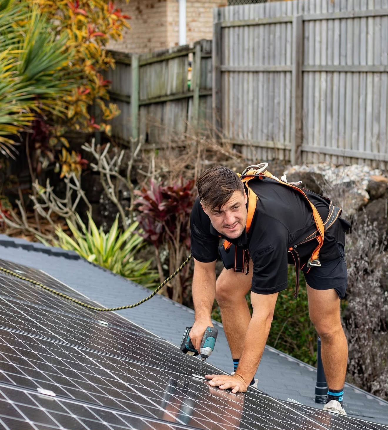 Smart Solar Group installer on a roof